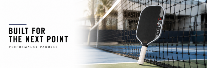 JOOLA pickleball paddle at the net