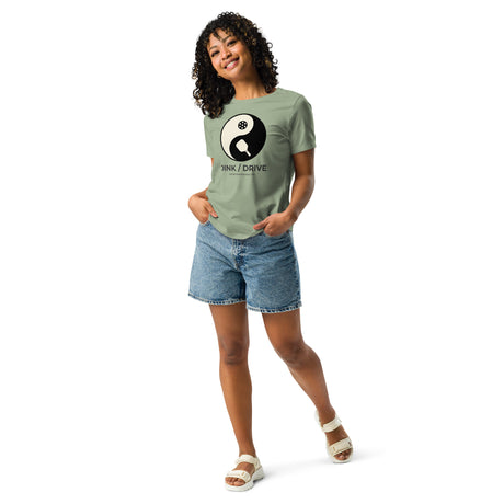 Model view of Dink / Drive Balance women’s tee in Sage, complete paddle and pickleball graphic visible