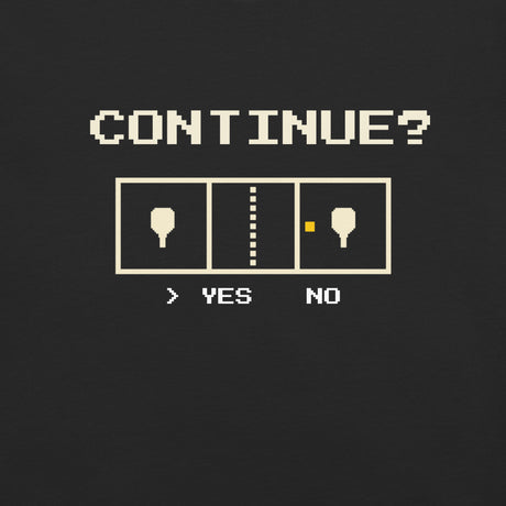 Close-up of the Black Continue? Pickleball Arcade Tee's cream pixel lettering and pickleball court artwork.