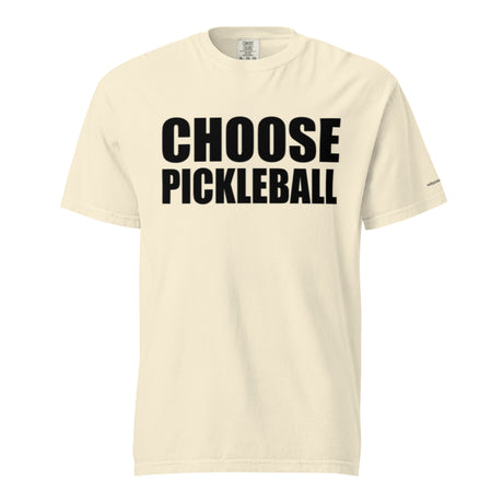 Ivory Choose Pickleball Tee on a shaped garment mockup, with bold black CHOOSE PICKLEBALL lettering.
