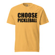 Mustard Choose Pickleball Tee on a shaped garment mockup, with bold black CHOOSE PICKLEBALL lettering.
