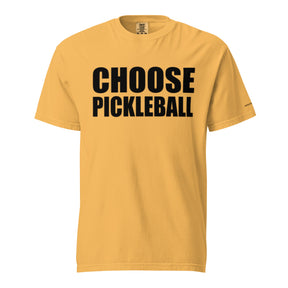 Mustard Choose Pickleball Tee on a shaped garment mockup, with bold black CHOOSE PICKLEBALL lettering.
