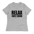 Athletic Heather Relax, Just Dink women’s tee in a textured flat lay, with bold black RELAX JUST DINK lettering.