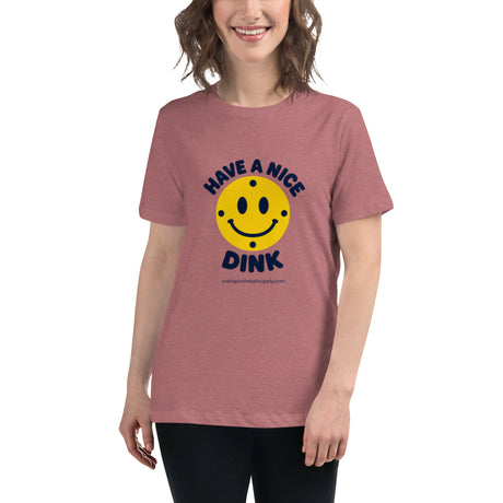 Heather Mauve Have a Nice Dink women’s tee worn by a model, with navy lettering and a yellow smiling pickleball.