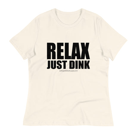 Natural Relax Just Dink Women's Tee in a textured flat lay, with bold black RELAX JUST DINK lettering.