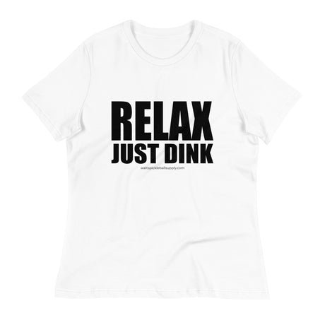 White Relax Just Dink Women's Tee in a textured flat lay, with bold black RELAX JUST DINK lettering.