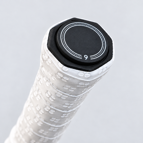 WPS weighted end cap installed on the butt end of a pickleball paddle handle